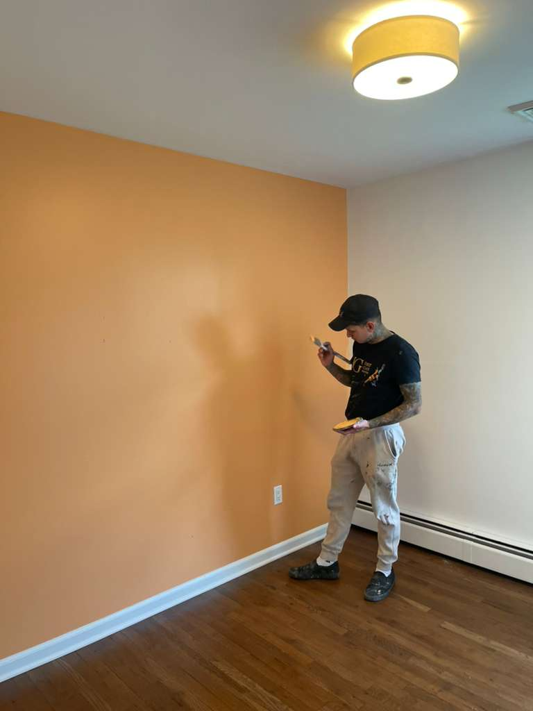 Finished hallway with crown molding painted by JG First Class Painting